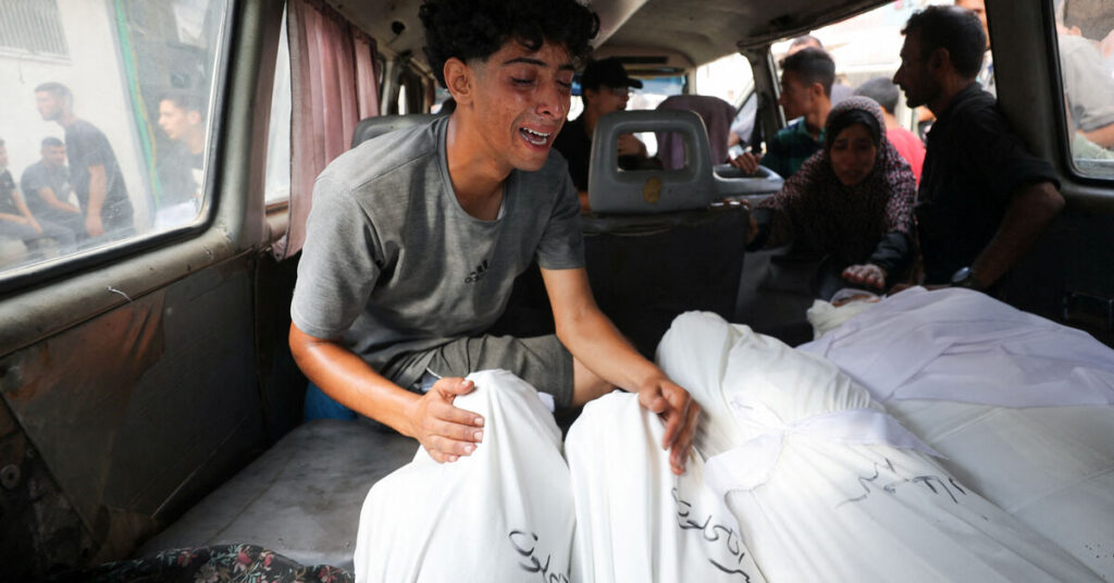 At least 32 killed by Israeli fire while seeking aid in Gaza, hospital says