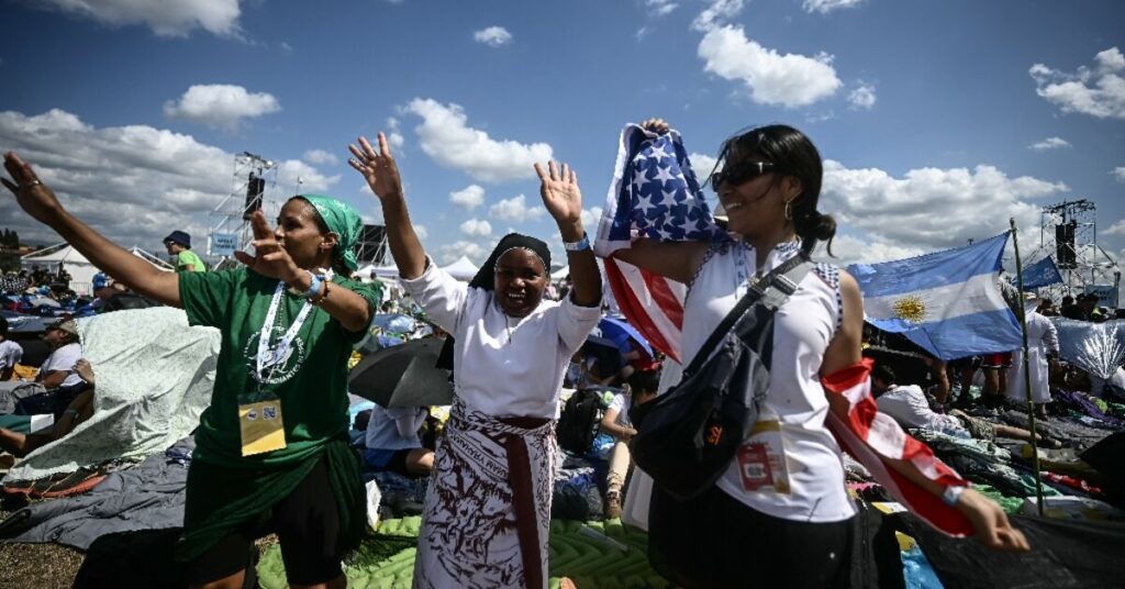 Elation as pope arrives by helicopter to open-air youth vigil in Rome