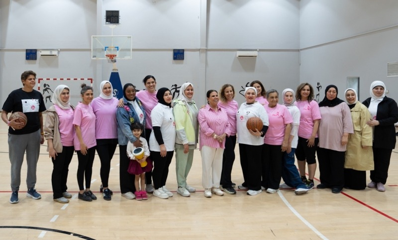 Cancer survivors triumph in basketball match promoting breast cancer awareness
